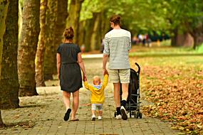 Woman Man Child family in park