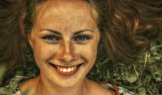 photo portrait of a girl with freckles