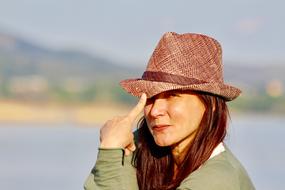 smiling woman in hat