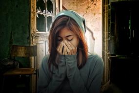 sad girl in hoody
