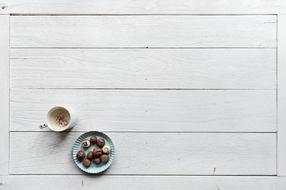 coffee and chocolate on a wooden table