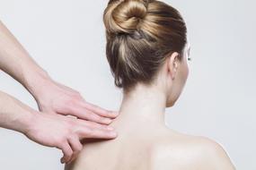 Person, massaging back of the woman