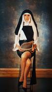 studio portrait of adult Woman in nunâs headdress