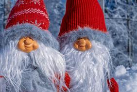 female and male dwarfs in winter closing, funny figurines