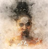 portrait of a dark-skinned girl with ritual drawings