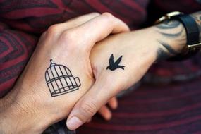 tattooed hands