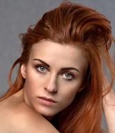 portrait of young beautiful red haired Woman