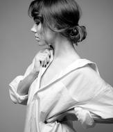 portrait of a woman in white shirt