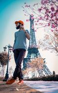 stylish young man on the background of the eiffel tower