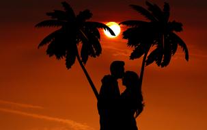 Silhouette of the kissing couple clipart