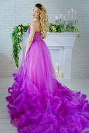 photo of a cute girl in a purple dress