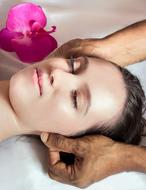 Woman, with the shiny skin, on the massage, near the beautiful, purple flower
