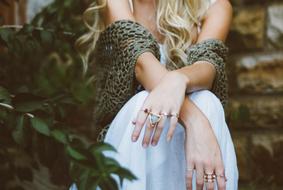 Blonde girl near the green plants