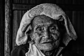 Black and white portrait of the old, covered Karen in Thailand