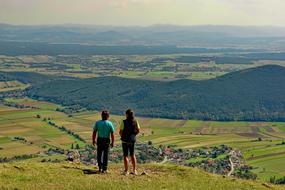 two friends enjoy the panorama of the valley