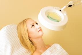 photo of a girl in a beautician chair
