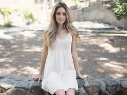 young woman in white sundress