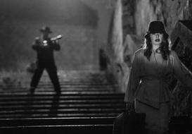 Black and white, grain, retro photo of the woman and man, in the forties