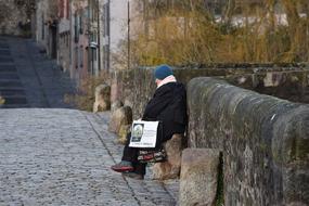 sitting outdoor senior woman