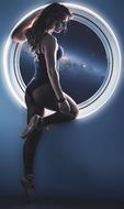 photo of a dancer at the window of a spaceship