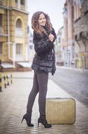 Suitcase and Girl Woman on street