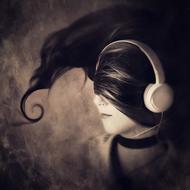 photo girl with headphones and hair on the face