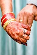 hands together at an indian wedding