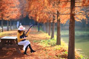 Autumn colors park Woman