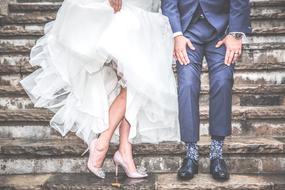 bride and groom on the steps