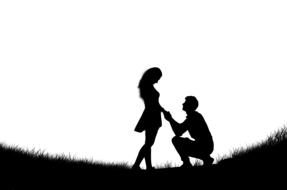 Silhouette of a couple in romance on landscape