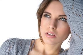 photo of a girl in a gray knitted sweater