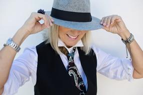 Woman with the suit and hat