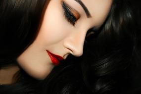 Portrait of evening makeup on face of young Woman