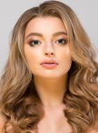 face of a girl with a haircut during a photo shoot