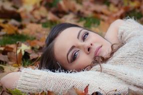 portrait of Girl Lying Down at Autumn