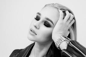 black and white portrait of a model with bright makeup