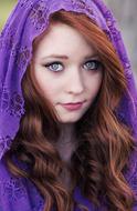 redhair woman in purple scarf