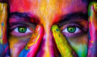 Portrait of a colorful woman with colorful eyes