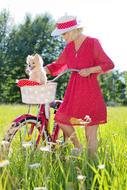 Woman with the dog on the grass