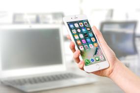 Woman Holding Smartphone