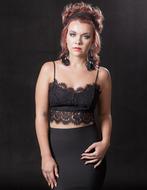 young sexy Woman posing in black clothing