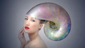 woman with mother-of-pearl shell on her head