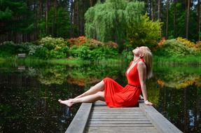 Women red dress Lake