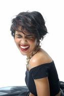 short-haired laughing brunette