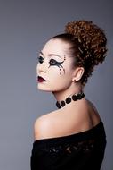 photo of a brunette with gothic makeup