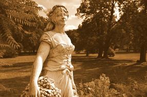sculpture of a woman in the park in monochrome