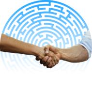 handshake in the background of a maze