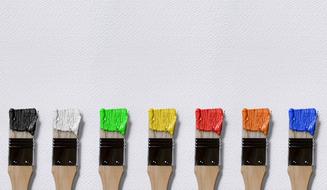 seven Brushes with colorful paint on Canvas