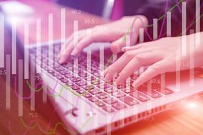female hands on the keyboard