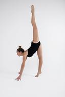 Flexible woman doing gymnastics